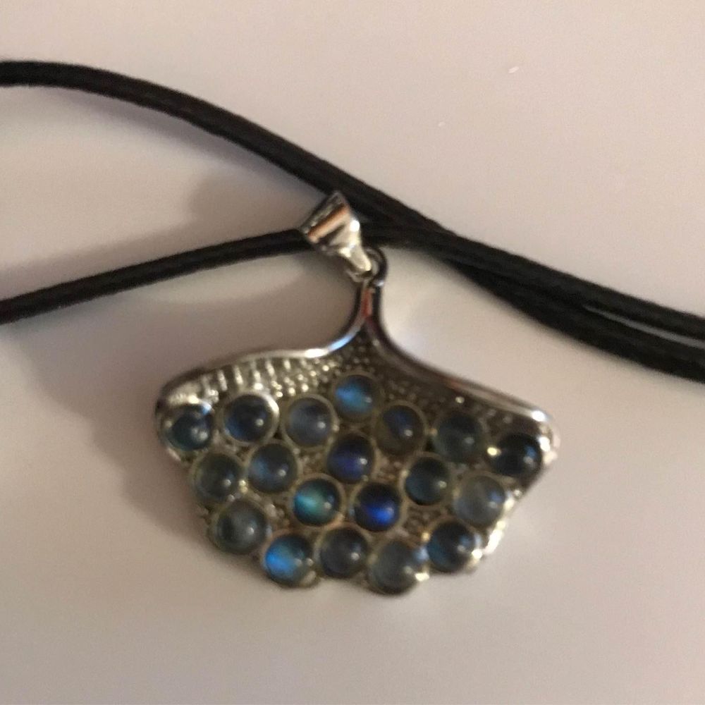 Gorgeous crystal leaf peacock charm on black cord necklace